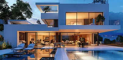 Modern luxury home with large glass windows and outdoor pool at dusk.
